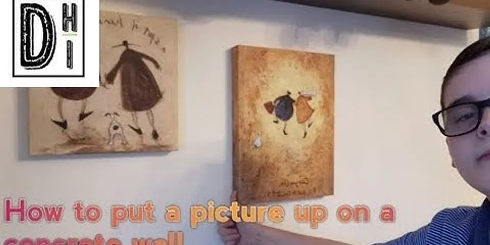 How to hang pictures on concrete walls